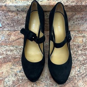 Nine West heels with strap.